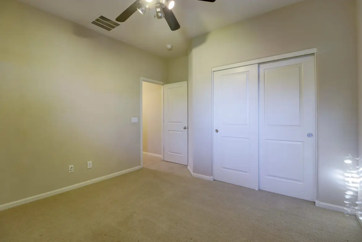 Bedroom four closet at 15359 W Columbine Dr in Surprise, Arizona.
