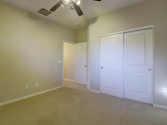 Bedroom four closet at 15359 W Columbine Dr in Surprise, Arizona.