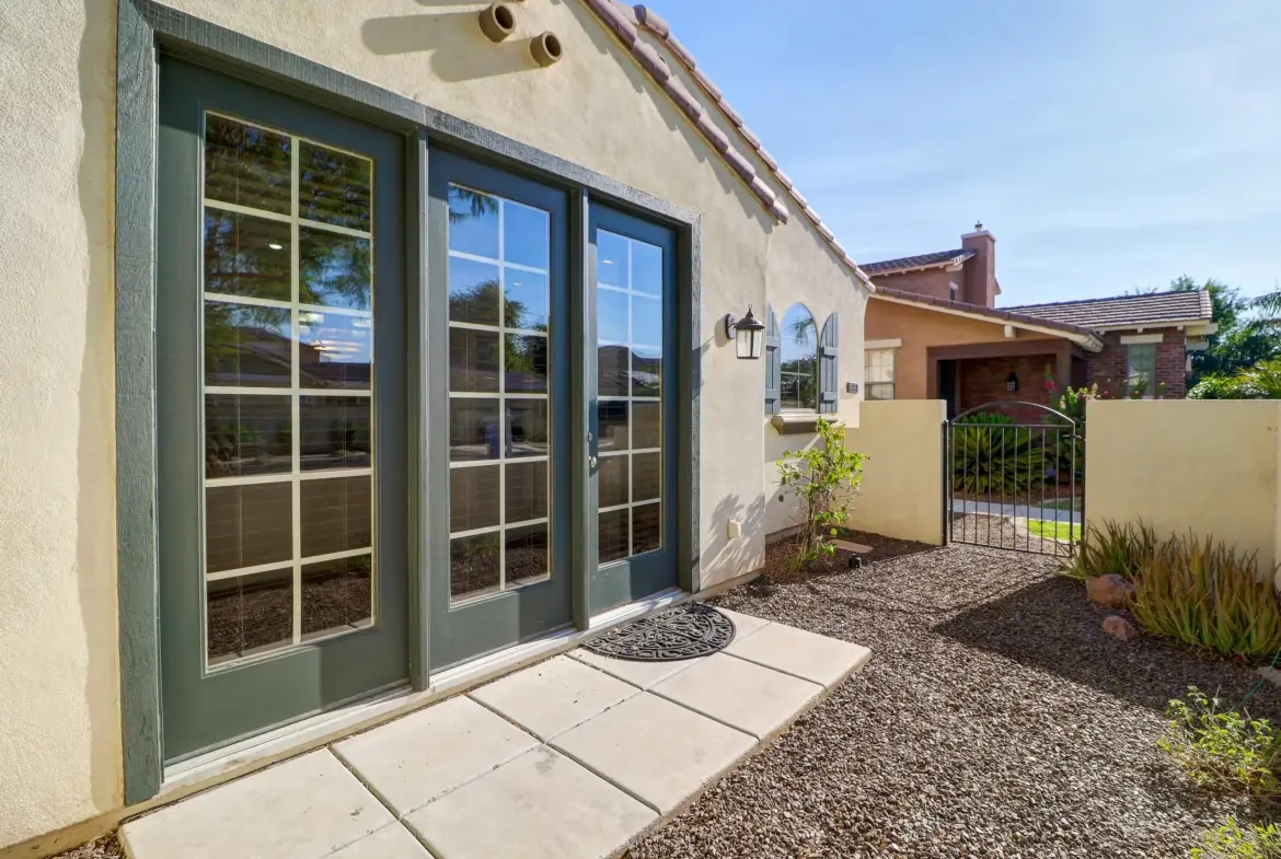 Patio french doors at 15359 W Columbine Dr in Surprise, Arizona.