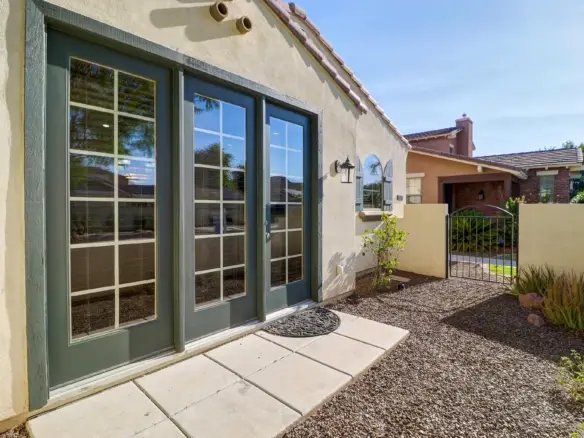 Patio french doors at 15359 W Columbine Dr in Surprise, Arizona.