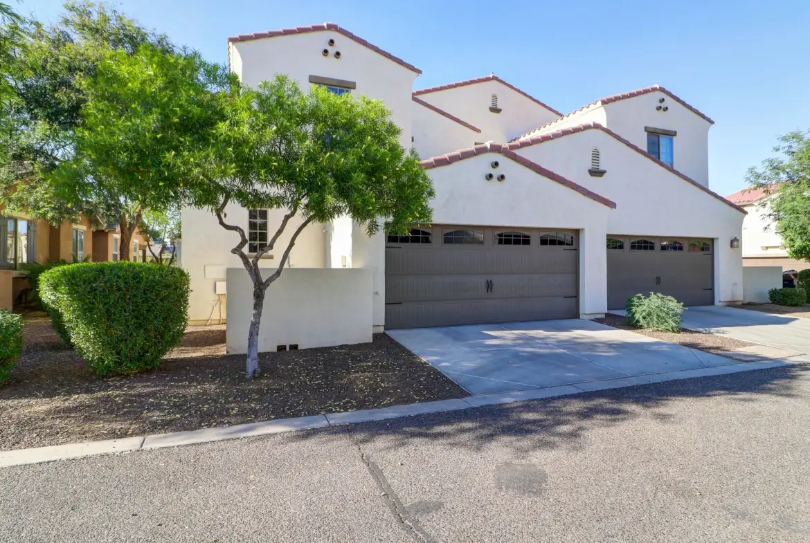 Garage and driveway at 15359 W Columbine Dr in Surprise, Arizona.