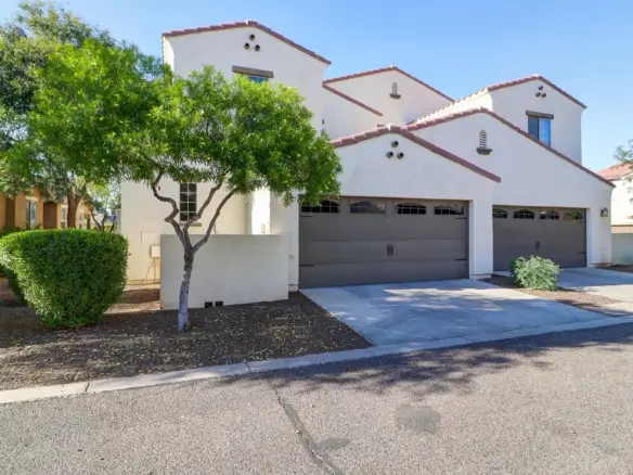 Garage and driveway at 15359 W Columbine Dr in Surprise, Arizona.